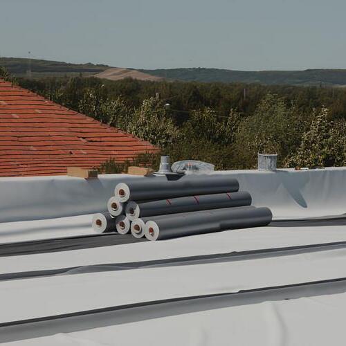 PVC membrane roofing being installed